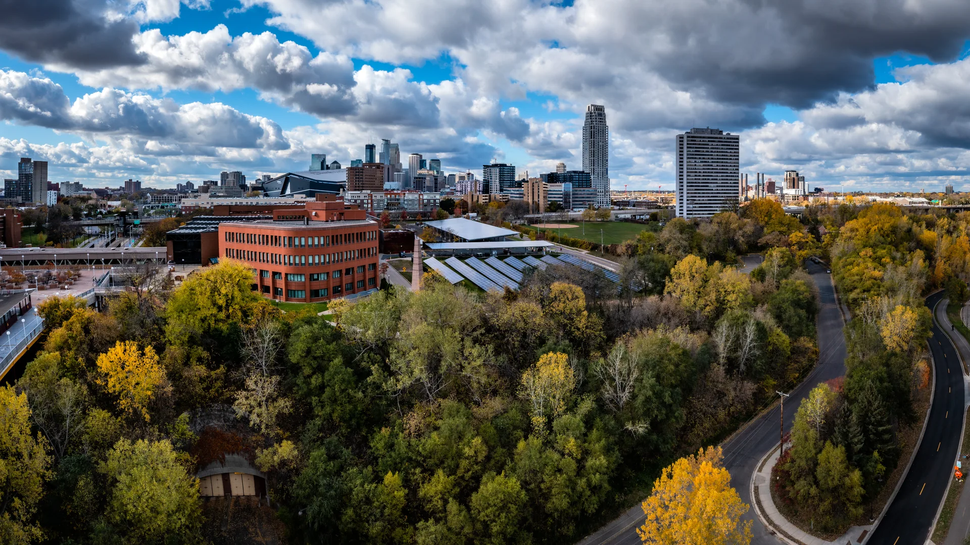 Aerial view of the river and campus buildings